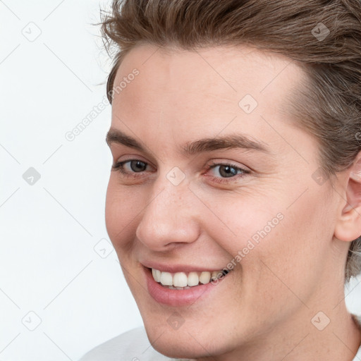 Joyful white young-adult female with medium  brown hair and grey eyes