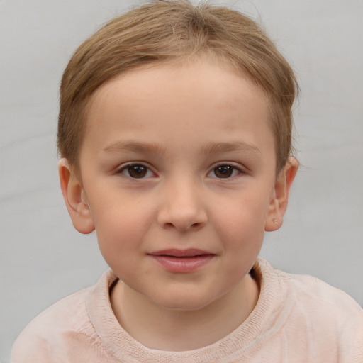 Joyful white child female with short  brown hair and brown eyes