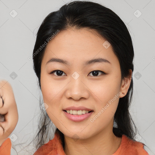 Joyful asian young-adult female with medium  black hair and brown eyes