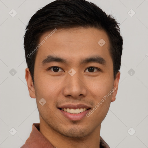 Joyful asian young-adult male with short  brown hair and brown eyes