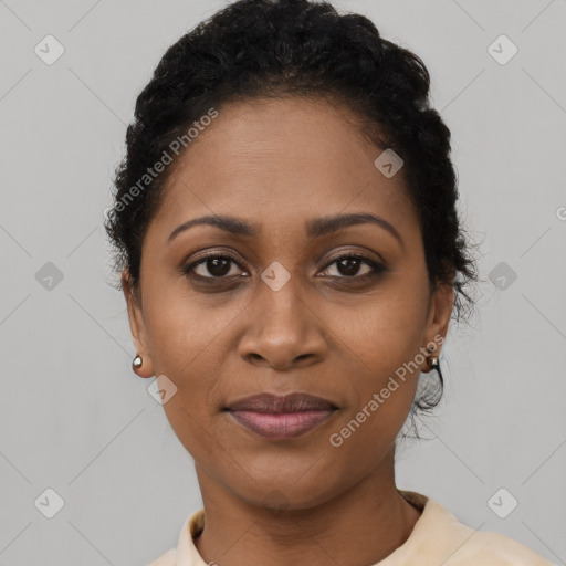 Joyful latino young-adult female with short  black hair and brown eyes