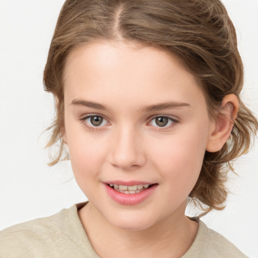 Joyful white child female with medium  brown hair and brown eyes