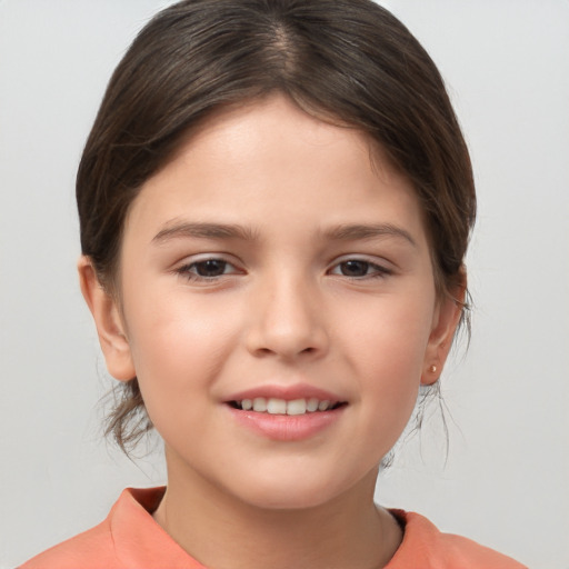 Joyful white child female with medium  brown hair and brown eyes