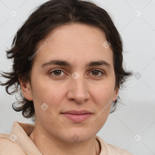 Joyful white adult female with medium  brown hair and brown eyes