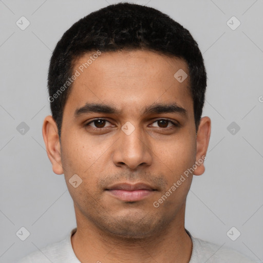 Neutral latino young-adult male with short  black hair and brown eyes