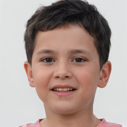 Joyful white child male with short  brown hair and brown eyes