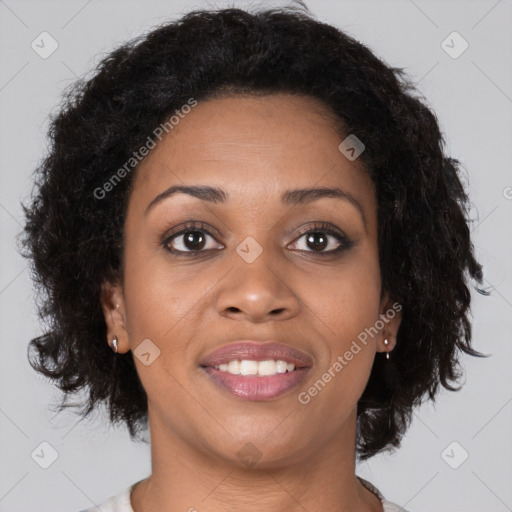 Joyful black young-adult female with long  brown hair and brown eyes