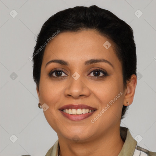 Joyful latino young-adult female with short  brown hair and brown eyes