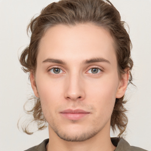 Neutral white young-adult male with medium  brown hair and brown eyes