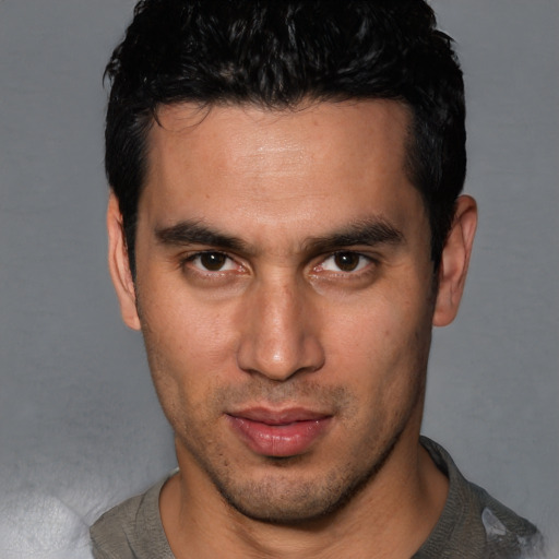 Neutral white young-adult male with short  black hair and brown eyes