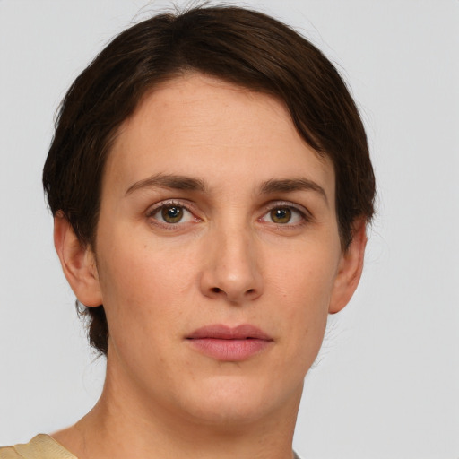 Neutral white young-adult female with short  brown hair and brown eyes