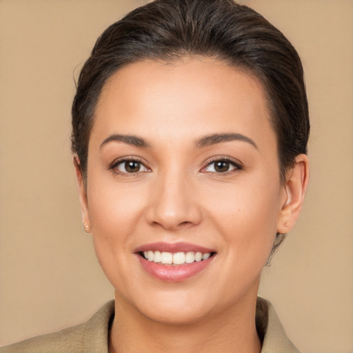 Joyful white young-adult female with medium  brown hair and brown eyes