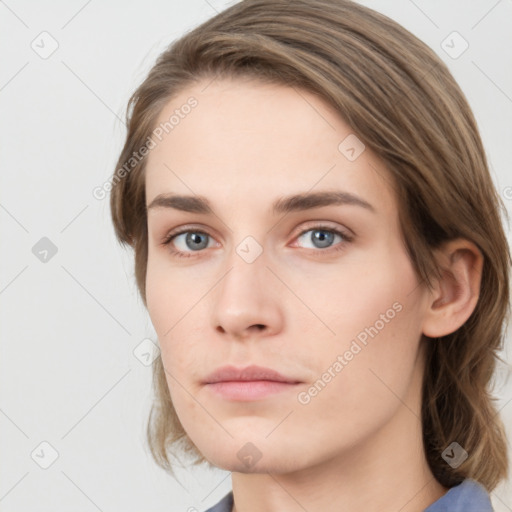 Neutral white young-adult female with medium  brown hair and grey eyes