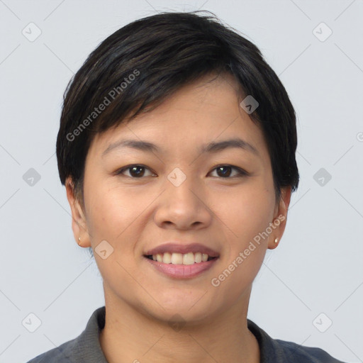 Joyful asian young-adult female with short  black hair and brown eyes