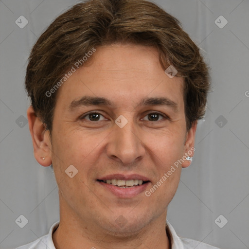 Joyful white adult male with short  brown hair and brown eyes