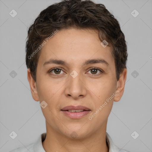 Joyful white adult female with short  brown hair and brown eyes