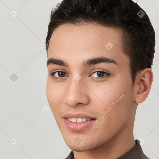 Joyful white young-adult male with short  brown hair and brown eyes