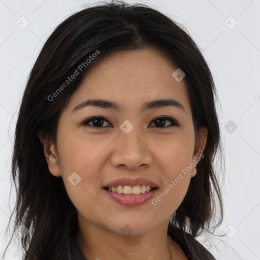 Joyful asian young-adult female with long  brown hair and brown eyes