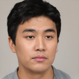 Neutral asian young-adult male with short  black hair and brown eyes