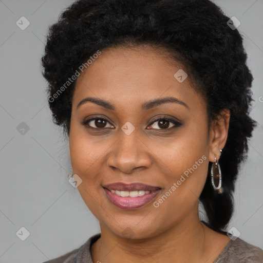 Joyful black young-adult female with medium  brown hair and brown eyes