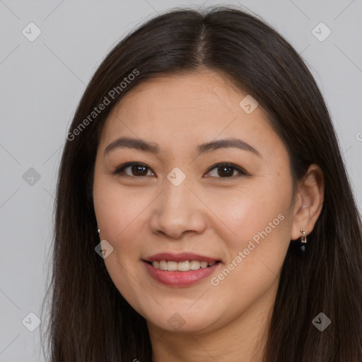 Joyful white young-adult female with long  brown hair and brown eyes