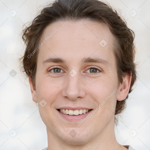 Joyful white young-adult female with medium  brown hair and green eyes