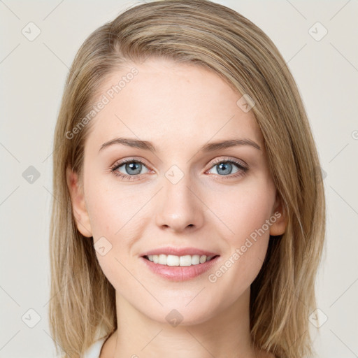 Joyful white young-adult female with long  brown hair and green eyes