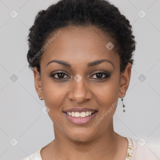 Joyful black young-adult female with short  black hair and brown eyes