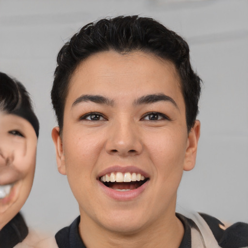 Joyful asian young-adult female with short  brown hair and brown eyes