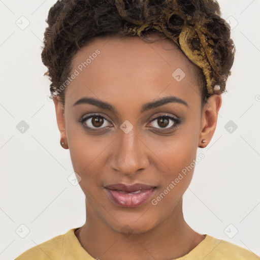 Joyful black young-adult female with short  brown hair and brown eyes