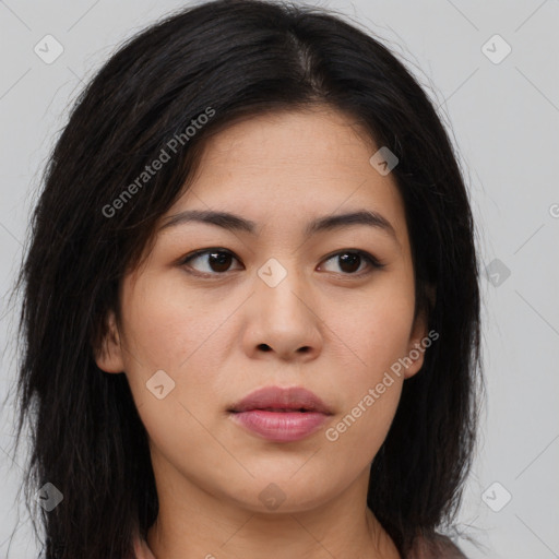 Joyful asian young-adult female with long  brown hair and brown eyes