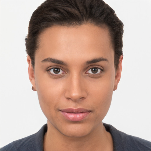 Joyful white young-adult female with short  brown hair and brown eyes