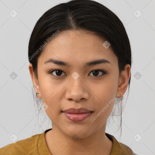 Joyful asian young-adult female with medium  brown hair and brown eyes