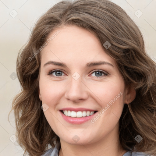 Joyful white young-adult female with medium  brown hair and green eyes