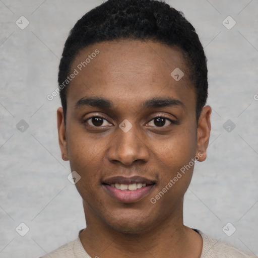 Joyful black young-adult male with short  black hair and brown eyes