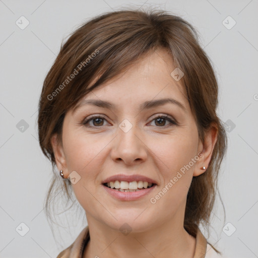 Joyful white young-adult female with medium  brown hair and grey eyes