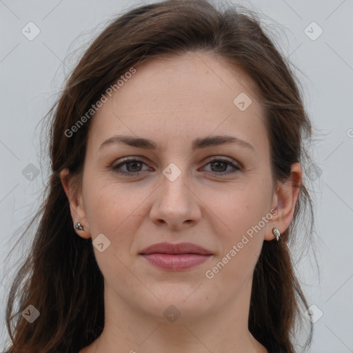 Joyful white young-adult female with long  brown hair and grey eyes