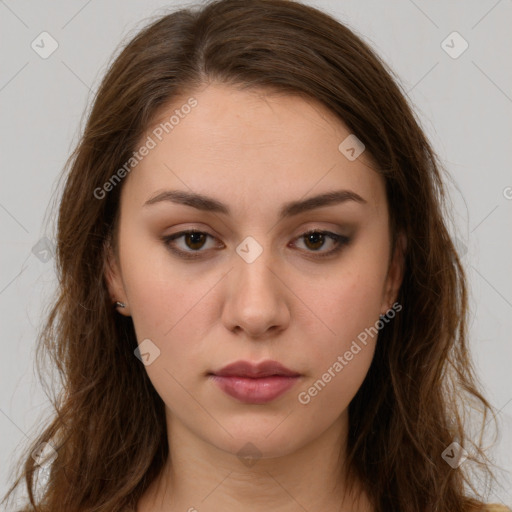 Neutral white young-adult female with long  brown hair and brown eyes