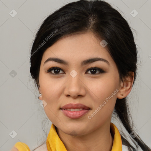 Joyful latino young-adult female with medium  brown hair and brown eyes