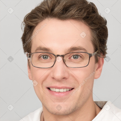 Joyful white adult male with short  brown hair and grey eyes