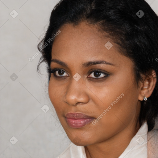 Joyful black young-adult female with medium  brown hair and brown eyes