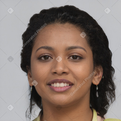 Joyful latino young-adult female with long  black hair and brown eyes