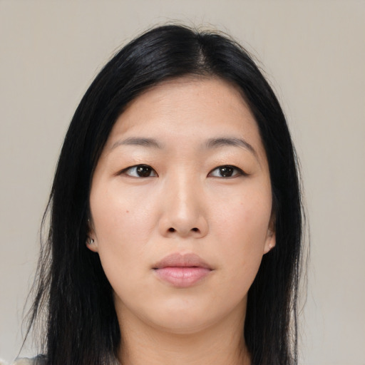 Neutral asian young-adult female with long  black hair and brown eyes
