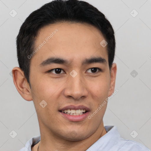 Joyful latino young-adult male with short  brown hair and brown eyes