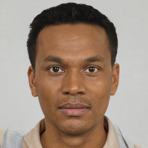 Neutral black young-adult male with short  black hair and brown eyes