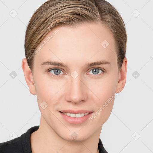 Joyful white young-adult female with short  brown hair and grey eyes