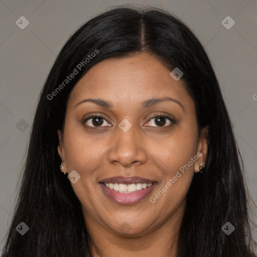 Joyful black young-adult female with long  black hair and brown eyes