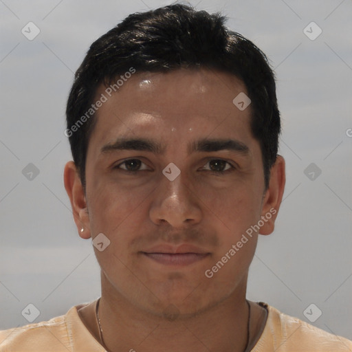Joyful white young-adult male with short  black hair and brown eyes