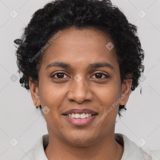 Joyful black young-adult female with short  brown hair and brown eyes