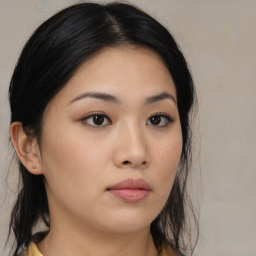 Neutral asian young-adult female with medium  black hair and brown eyes
